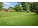 Lush green backyard, perfect for recreation and relaxation at 3563 Carriage Way, East Point, GA 30344