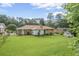 Large backyard with a shed and mature trees at 3563 Carriage Way, East Point, GA 30344
