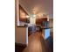 Modern kitchen featuring stainless steel appliances and dark wood cabinets at 898 Oak St Sw # 1215, Atlanta, GA 30310