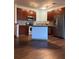 Updated kitchen with stainless appliances, dark cabinets, and tiled backsplash at 898 Oak St Sw # 1215, Atlanta, GA 30310
