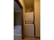 A laundry room showcasing a stackable washer and dryer set and an adjacent shower at 898 Oak St Sw # 1215, Atlanta, GA 30310