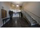 Apartment lobby features tile floors, stairs, an upper level, and a decorative plant at 898 Oak St Sw # 1215, Atlanta, GA 30310