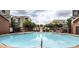 Large community pool with seating and attractive landscaping at 898 Oak St Sw # 1215, Atlanta, GA 30310