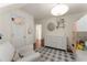 Charming bedroom featuring bunk beds, a dresser, a soft chair and playful décor at 999 Seaboard Nw Ave, Atlanta, GA 30318