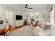 Cozy living room featuring neutral colors, ceiling fan, and access to other rooms at 999 Seaboard Nw Ave, Atlanta, GA 30318