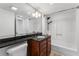 Well-lit bathroom featuring a combination shower and tub with a modern vanity and granite countertop at 1280 W Peachtree Street Nw # 808, Atlanta, GA 30309