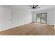 Bedroom with ceiling fan and sliding glass doors to balcony at 1280 W Peachtree Street Nw # 808, Atlanta, GA 30309