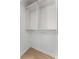 A closet with shelving providing storage, adding organization and functionality to the living space at 1280 W Peachtree Street Nw # 808, Atlanta, GA 30309