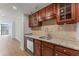 Bright kitchen with granite counters and stainless steel appliances at 1280 W Peachtree Street Nw # 808, Atlanta, GA 30309