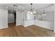 Bright living room area with decorative lighting and mirrored wall at 1280 W Peachtree Street Nw # 808, Atlanta, GA 30309