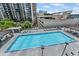Large, inviting pool with lounge chairs offers a refreshing escape with city views and lush surroundings at 1280 W Peachtree Street Nw # 808, Atlanta, GA 30309