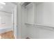 Organized walk-in closet equipped with shelving, offering ample storage space for clothing and accessories at 1280 W Peachtree Street Nw # 808, Atlanta, GA 30309