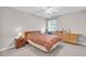 Bright bedroom boasting standard closet, neutral paint, and carpet flooring at 1530 Brisbane Dr, Dacula, GA 30019