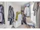 Walk-in closet with ample storage space and natural light from the window at 1530 Brisbane Dr, Dacula, GA 30019