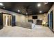 Spacious basement featuring a large tv, ceiling fan, and comfortable seating at 2822 Prado Ln, Marietta, GA 30066