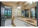 Spacious bathroom featuring a double vanity with framed mirrors and great lighting at 2822 Prado Ln, Marietta, GA 30066