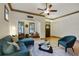 Bright living room boasts hardwood floors, large windows, and modern decor for comfortable living at 2822 Prado Ln, Marietta, GA 30066
