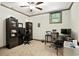 Office with neutral walls, carpet, ceiling fan, window and furniture at 2822 Prado Ln, Marietta, GA 30066