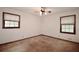 Bedroom with two windows and neutral carpet at 3409 Shorelake Dr, Tucker, GA 30084