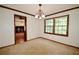 Bright dining room features natural light, crown moulding, and an elegant chandelier at 3409 Shorelake Dr, Tucker, GA 30084