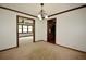 Inviting dining area with chandelier, wood trim, and seamless flow to the kitchen and living spaces at 3409 Shorelake Dr, Tucker, GA 30084