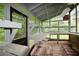Greenhouse featuring shelving, brick floor, and windows at 3409 Shorelake Dr, Tucker, GA 30084