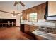 Kitchen includes oak cabinets, marbled countertops, and stainless steel appliances at 3409 Shorelake Dr, Tucker, GA 30084