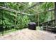 Patio with grill and railings overlooking a lush backyard at 3409 Shorelake Dr, Tucker, GA 30084
