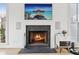 Cozy fireplace featuring dark stone and hearth, TV above, and built-in speakers at , Atlanta, GA 30315