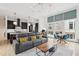 Open concept living space featuring modern kitchen and a reclining sofa at , Atlanta, GA 30315
