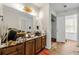Bathroom showing a vanity with a mirror, a closed closet door and floor debris at 1003 Cannongate Sw Xing, Marietta, GA 30064