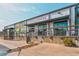 Exterior view of a coffee shop with outside seating and a vibrant mural at 1258 Campbellton Sw Rd, Atlanta, GA 30310
