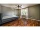 Bedroom with hardwood floors, ceiling fan and natural light at 136 Peachtree Memorial Nw Dr # Pa4, Atlanta, GA 30309
