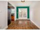 Dining room with wood floors and French doors, open to the kitchen at 136 Peachtree Memorial Nw Dr # Pa4, Atlanta, GA 30309