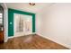 Bright dining room with wood floors and French doors to the backyard at 136 Peachtree Memorial Nw Dr # Pa4, Atlanta, GA 30309