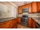 Updated kitchen with stainless steel appliances and granite countertops at 136 Peachtree Memorial Nw Dr # Pa4, Atlanta, GA 30309