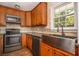 Updated kitchen with stainless steel appliances and granite countertops at 136 Peachtree Memorial Nw Dr # Pa4, Atlanta, GA 30309