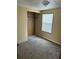 Bedroom featuring a closet and natural light from a window at 1631 Billy Bullock Rd, Dallas, GA 30157