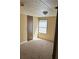 Simple, carpeted bedroom with lots of natural light at 1631 Billy Bullock Rd, Dallas, GA 30157