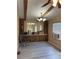 Living Room featuring hard surface floors, an air conditioner, beams and a chandelier at 1631 Billy Bullock Rd, Dallas, GA 30157