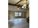 Spacious living room with wood-look floors and a large ceiling fan at 1631 Billy Bullock Rd, Dallas, GA 30157