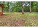 Expansive backyard with trees and greenery offering a private outdoor space at 223 Dogwood Ln, Lawrenceville, GA 30046
