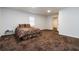 Spacious bedroom featuring a large bed, neutral walls, and carpeted floors, providing a comfortable and inviting atmosphere at 223 Dogwood Ln, Lawrenceville, GA 30046