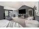 Expansive bedroom features a cozy seating area, large windows, and neutral decor at 2780 Lakeview Walk, Decatur, GA 30035