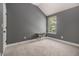 Cozy bedroom with neutral carpet, a window, and simple, stylish furniture at 2780 Lakeview Walk, Decatur, GA 30035