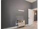 Bedroom with a gray accent wall and a small mirrored accent table next to a doorway at 2780 Lakeview Walk, Decatur, GA 30035
