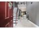 Elegant foyer with marble tile flooring and view of the staircase and spacious living area at 2780 Lakeview Walk, Decatur, GA 30035