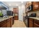Efficient kitchen layout with granite countertops, stainless steel appliances, and ample cabinet space at 2780 Lakeview Walk, Decatur, GA 30035