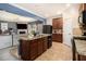 Open-concept kitchen with granite countertops, a center island, and seamless flow to the living area at 2780 Lakeview Walk, Decatur, GA 30035