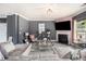 Modern living room with plush seating, fireplace, and contemporary decor for comfortable living at 2780 Lakeview Walk, Decatur, GA 30035